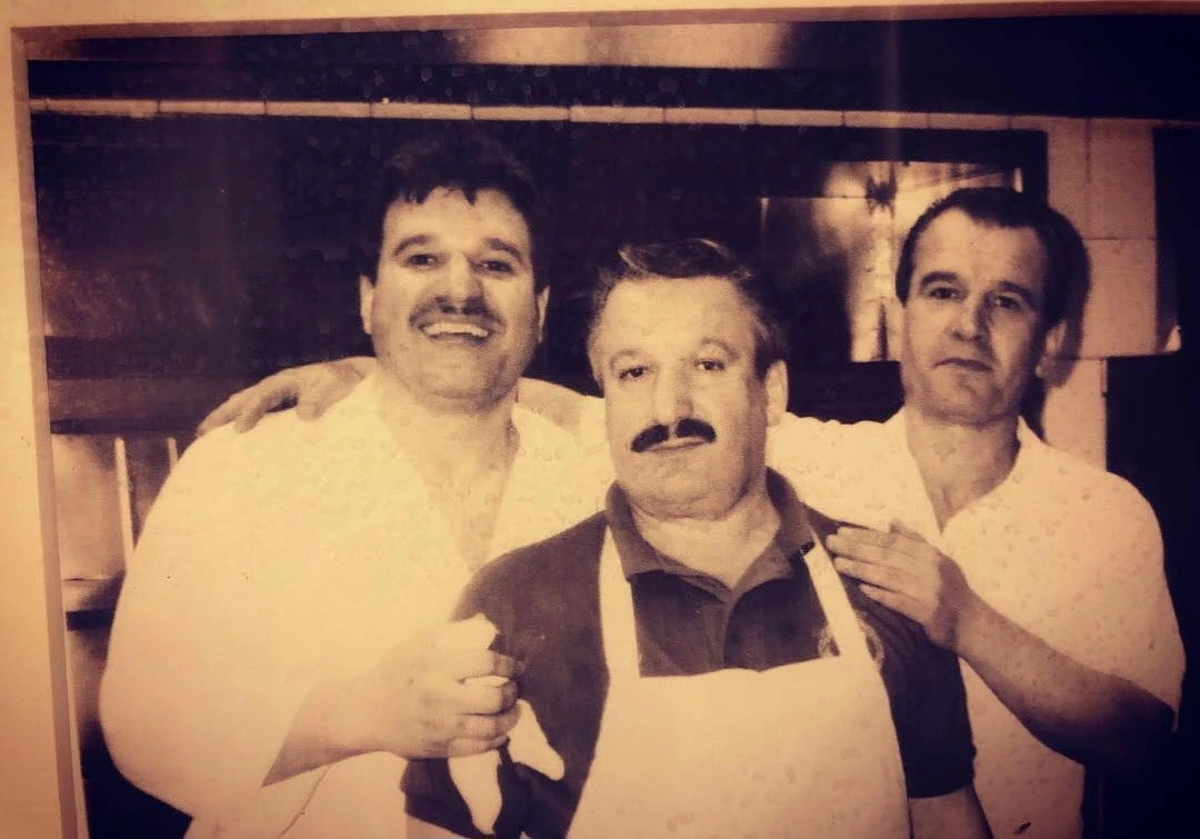 Historical photograph of the Bekteshi brothers, Don, Eli and John, at Villa Milano in Manhasset